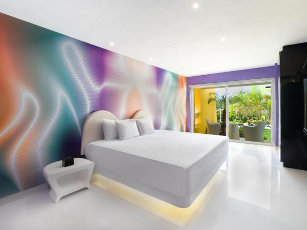 Temptation Cancun Resort - All Inclusive - Adults Only : photo 1 de la chambre hébergement chic - vue sur jardin