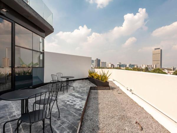 Wynwood House Darwin : photo 1 de la chambre appartement avec terrasse