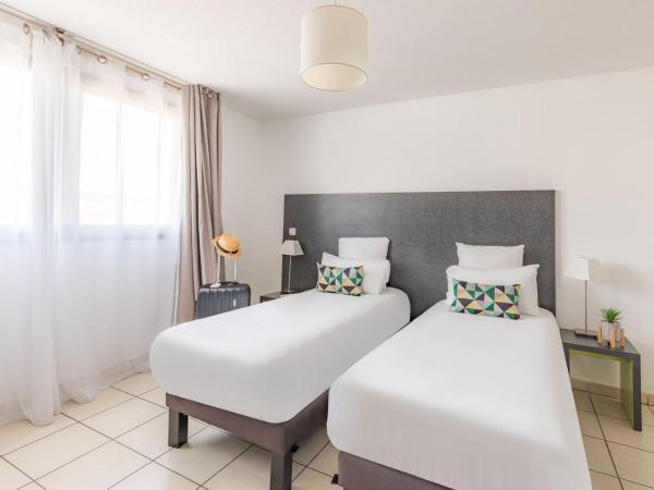 Appart'City Confort La Ciotat - Côté Port : photo 1 de la chambre studio lits jumeaux