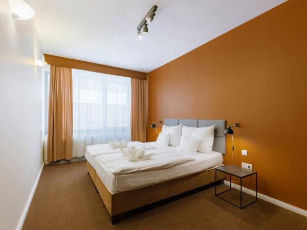 Bliss Residence & Spa : photo 1 de la chambre appartement 1 chambre avec accès au spa pour 4 personnes