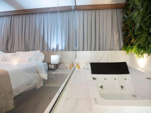 Intercity BH Expo : photo 1 de la chambre suite deluxe avec baignoire spa