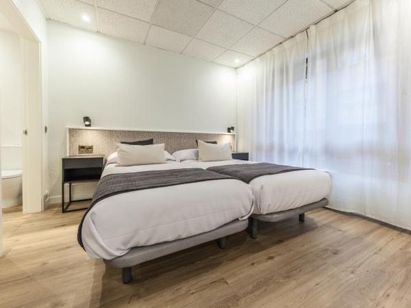 Auditorio Rooms Boutique Oviedo : photo 2 de la chambre chambre double (1 adulte et 1 enfant)