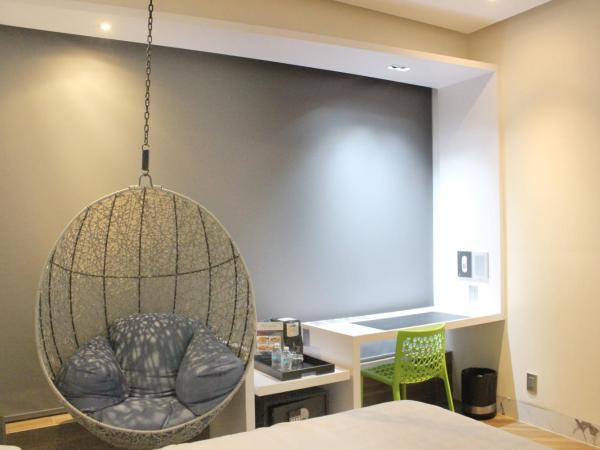 WeEnjoy Hotels Grand Prix Aeropuerto CDMX : photo 6 de la chambre suite