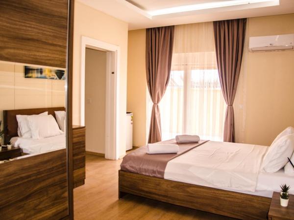 Flamingo Residence : photo 1 de la chambre suite junior avec terrasse sans cuisine