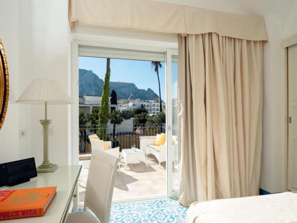 Hotel Syrene : photo 4 de la chambre chambre triple - vue sur jardin