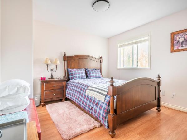 Fraser River Richmond Bed and Breakfast : photo 1 de la chambre chambre lit queen-size