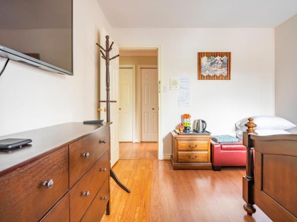 Fraser River Richmond Bed and Breakfast : photo 4 de la chambre chambre lit queen-size