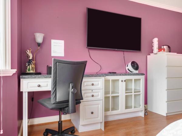 Fraser River Richmond Bed and Breakfast : photo 4 de la chambre suite deluxe avec lit king-size