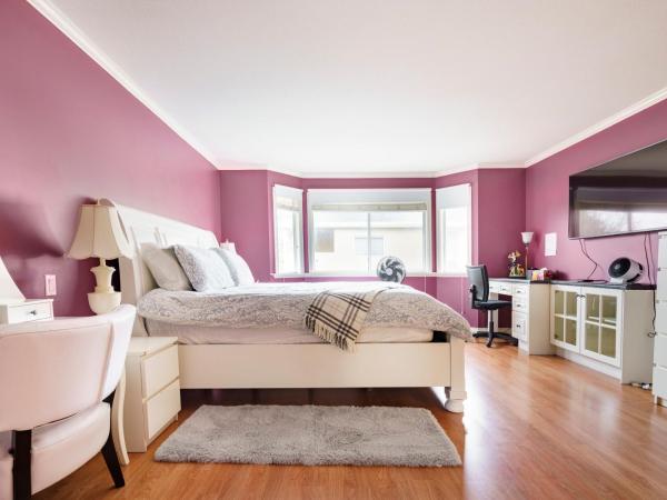 Fraser River Richmond Bed and Breakfast : photo 1 de la chambre suite deluxe avec lit king-size