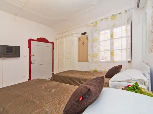 Apartments & Rooms Orlando : photo 4 de la chambre chambre double ou lits jumeaux - annexe