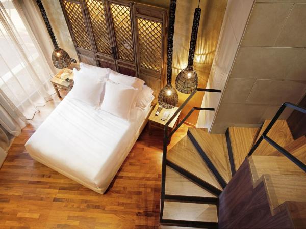 Claris Hotel & Spa GL, a Small Luxury Hotel of the World : photo 3 de la chambre suite en duplex