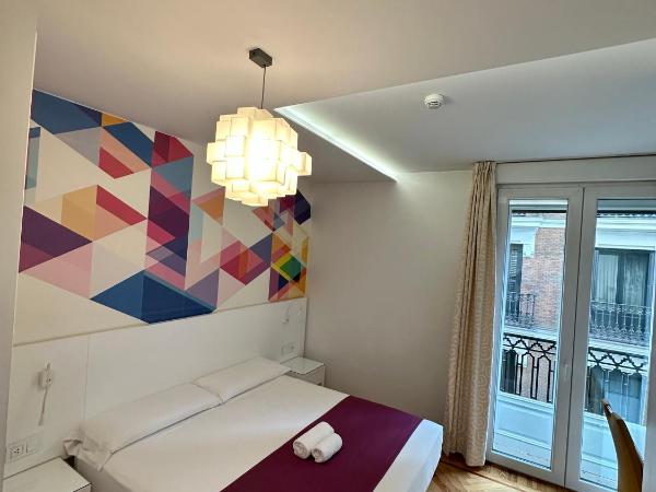 Hostal Abadia Madrid : photo 5 de la chambre chambre double avec balcon - vue sur ville