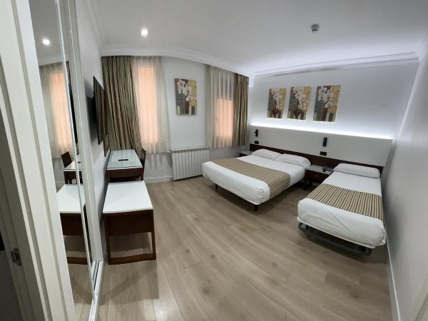Hostal Abadia Madrid : photo 1 de la chambre chambre lits jumeaux