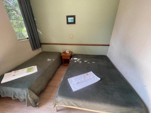 Hara Palace Hotel : photo 1 de la chambre chambre triple avec 1 lit simple et 1 lit double