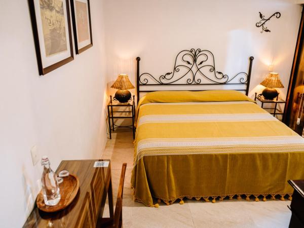 La Casa Carlota : photo 2 de la chambre chambre lit king-size - intérieur