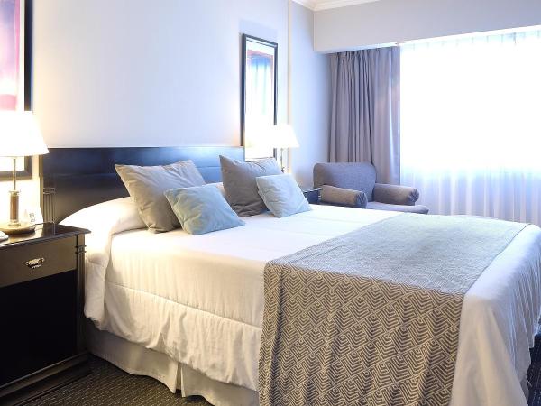 Plaza Real Suites Hotel : photo 1 de la chambre chambre lit queen-size 