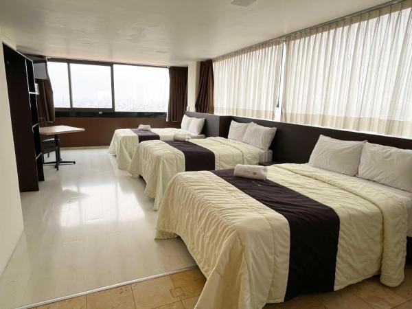 Puebla Inn Express : photo 3 de la chambre chambre triple