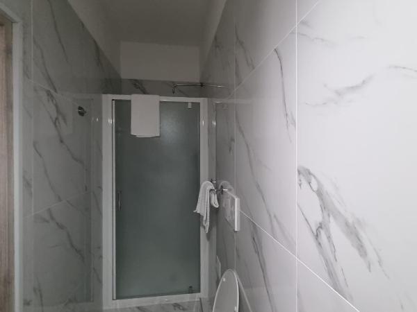 Albergo Casa Peron : photo 7 de la chambre chambre quadruple avec salle de bains privative