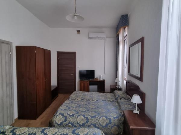 Albergo Casa Peron : photo 4 de la chambre chambre quadruple avec salle de bains privative