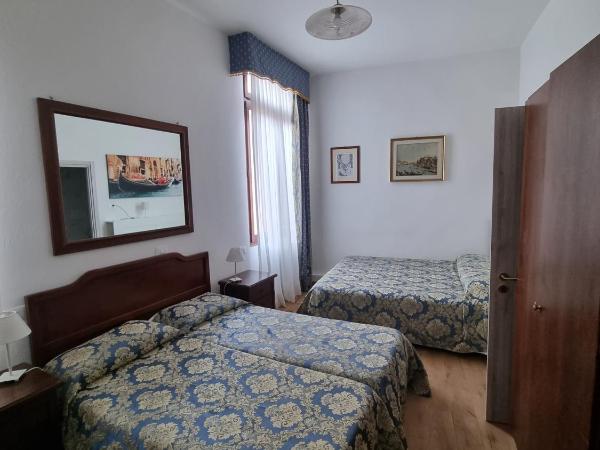 Albergo Casa Peron : photo 3 de la chambre chambre quadruple avec salle de bains privative