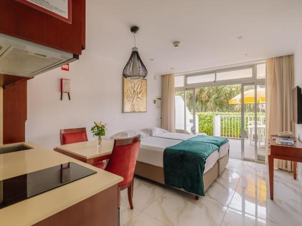 Muthu Clube Praia da Oura : photo 1 de la chambre chambre standard avec terrasse