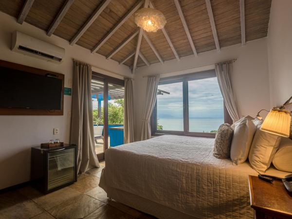 La Pedrera Small Hotel & Spa : photo 1 de la chambre chambre de luxe avec vue sur mer
