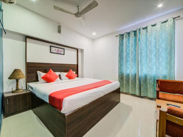 OYO Hotel Meredian Orchid Near Birla Mandir : photo 1 de la chambre chambre triple classique