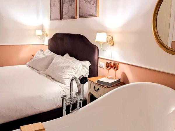 Macchiato Suites Boutique Guest House : photo 2 de la chambre chambre double deluxe avec baignoire