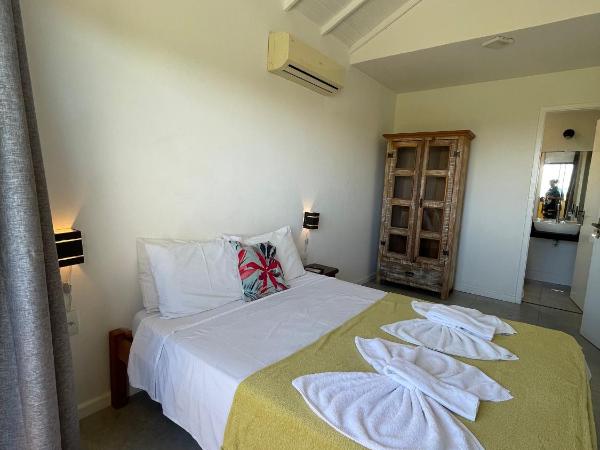 Pousada Mar'Tito Forno : photo 2 de la chambre chambre double avec patio