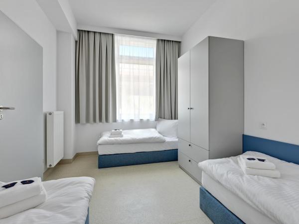 Apartgdynia : photo 6 de la chambre chambre quadruple