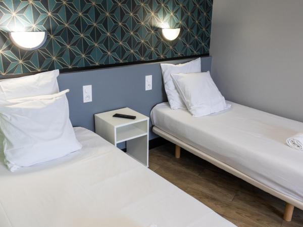 Hotel Luxia : photo 2 de la chambre chambre lits jumeaux