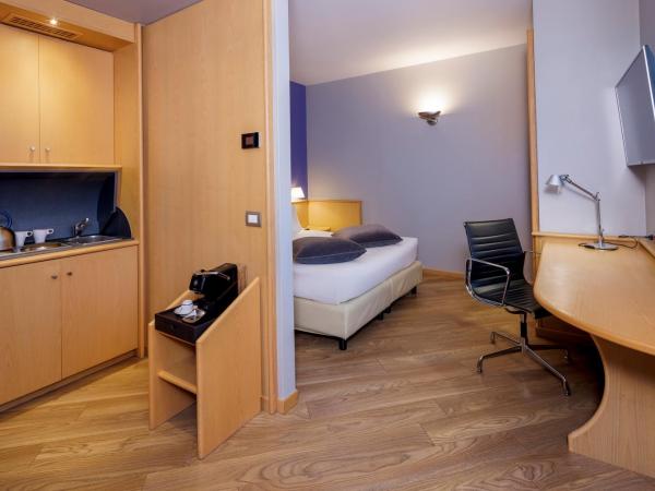 Best Western Plus Executive Hotel and Suites : photo 3 de la chambre chambre lit queen-size de luxe avec lit simple