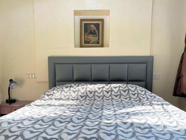 Golf-Sea-City Guest House : photo 3 de la chambre chambre lit queen-size avec balcon