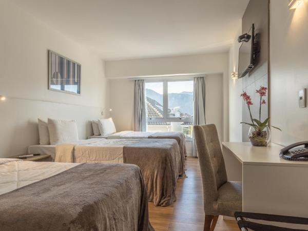 Americas Townhouse Hotel : photo 2 de la chambre chambre triple standard