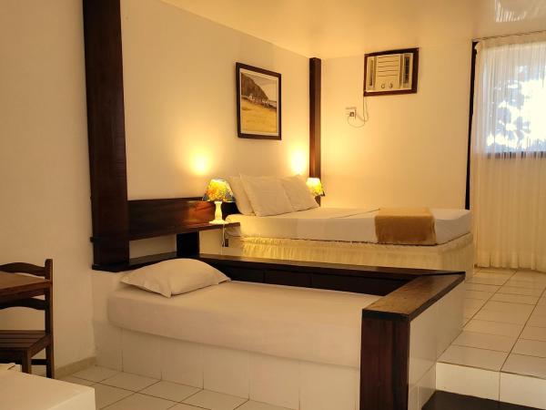 Pousada Casa do Catavento : photo 4 de la chambre chambre double standard premium