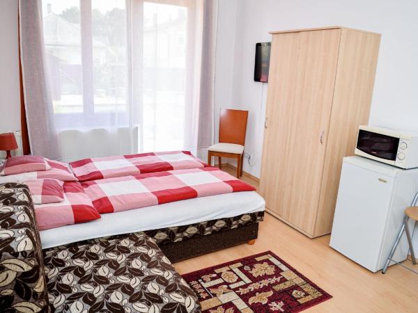 SovaApartman : photo 5 de la chambre chambre triple Économique