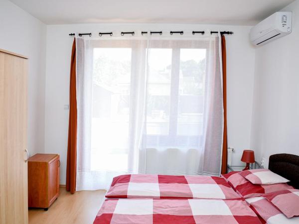 SovaApartman : photo 4 de la chambre chambre triple Économique