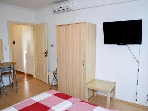 SovaApartman : photo 9 de la chambre chambre triple avec balcon