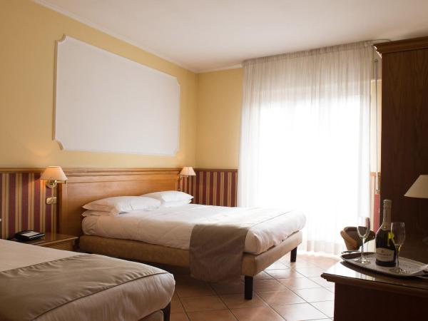 Hotel Leopardi : photo 4 de la chambre chambre triple