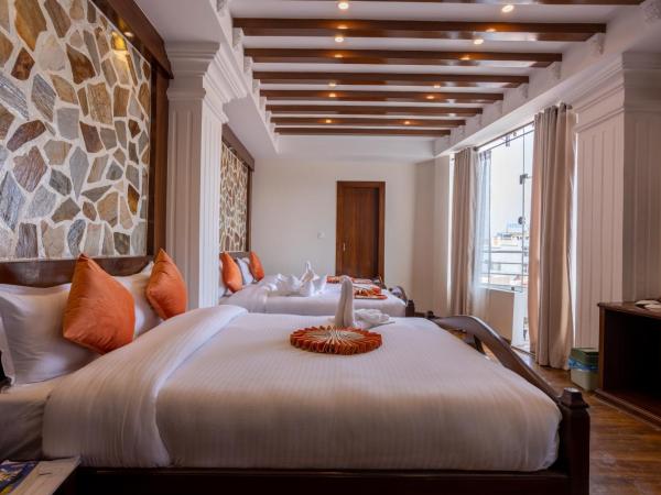 Airport Himalaya Boutique Hotel : photo 9 de la chambre chambre quadruple avec balcon
