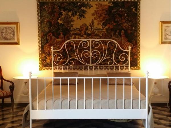 Aretè Guest House : photo 9 de la chambre chambre triple - vue sur mer