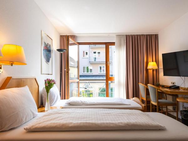 CityHotel Feuerbach : photo 1 de la chambre chambre lits jumeaux standard