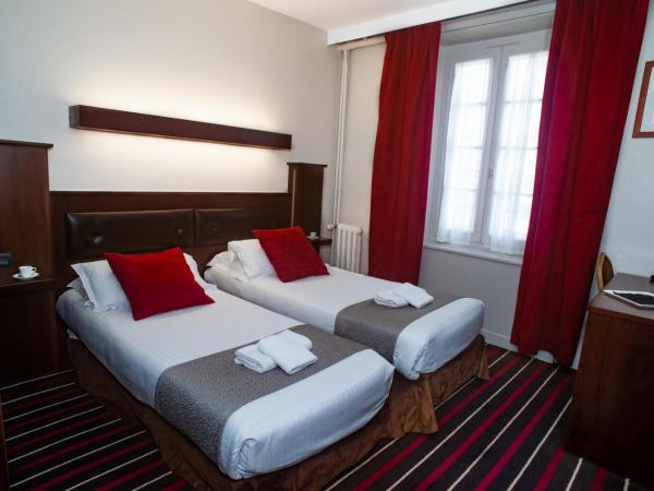 Hotel De L'univers : photo 1 de la chambre chambre lits jumeaux confort