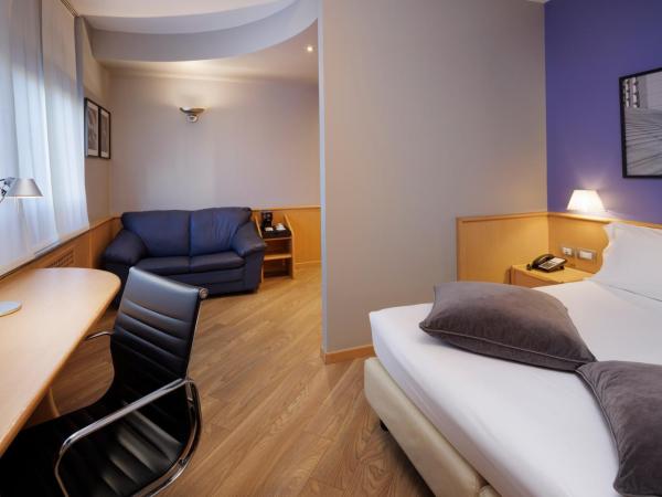 Best Western Plus Executive Hotel and Suites : photo 2 de la chambre chambre lit queen-size de luxe avec lit simple