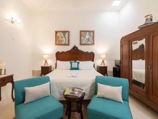 Casa Dos Lirios Hotel Boutique : photo 10 de la chambre chambre lit king-size deluxe