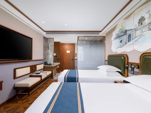 Time Traveller Boutique Hotel - Near National Convention Centre, National Stadium , Olympic Forest Park , National Tennis Center, Beishatan subway station, Hail taxi, Free laundry, Tourism consultation : photo 2 de la chambre chambre lits jumeaux supérieure