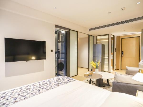 Canopy Executive Apartments - Shenzhen Futian Center : photo 4 de la chambre studio avec balcon 