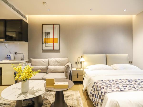 Canopy Executive Apartments - Shenzhen Futian Center : photo 1 de la chambre studio avec balcon 