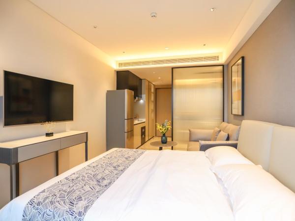 Canopy Executive Apartments - Shenzhen Futian Center : photo 2 de la chambre appartement supérieur