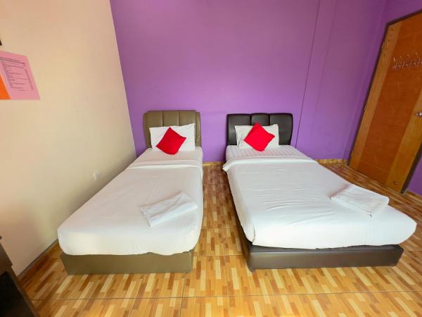 Borneo Inn : photo 4 de la chambre chambre lits jumeaux standard